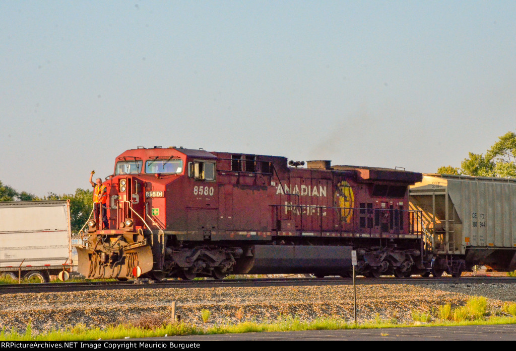 CP AC44CW Locomotive leading a train